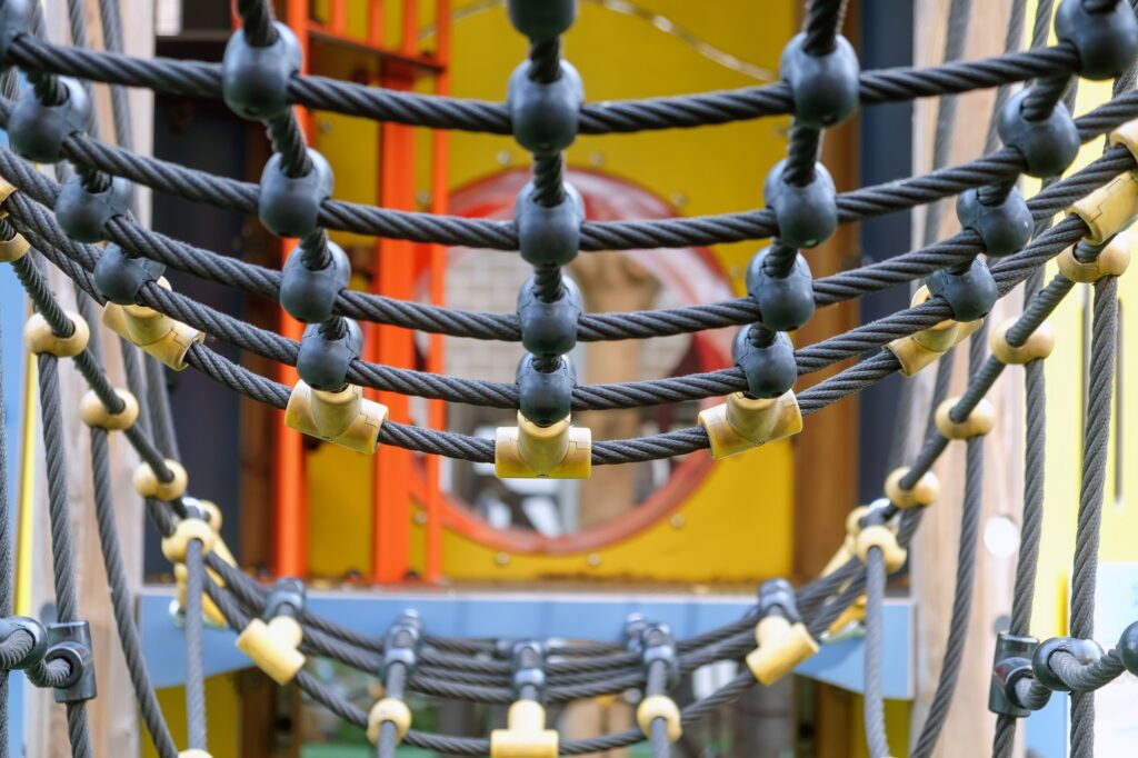 Closeup of a rope bridge in a park's playground